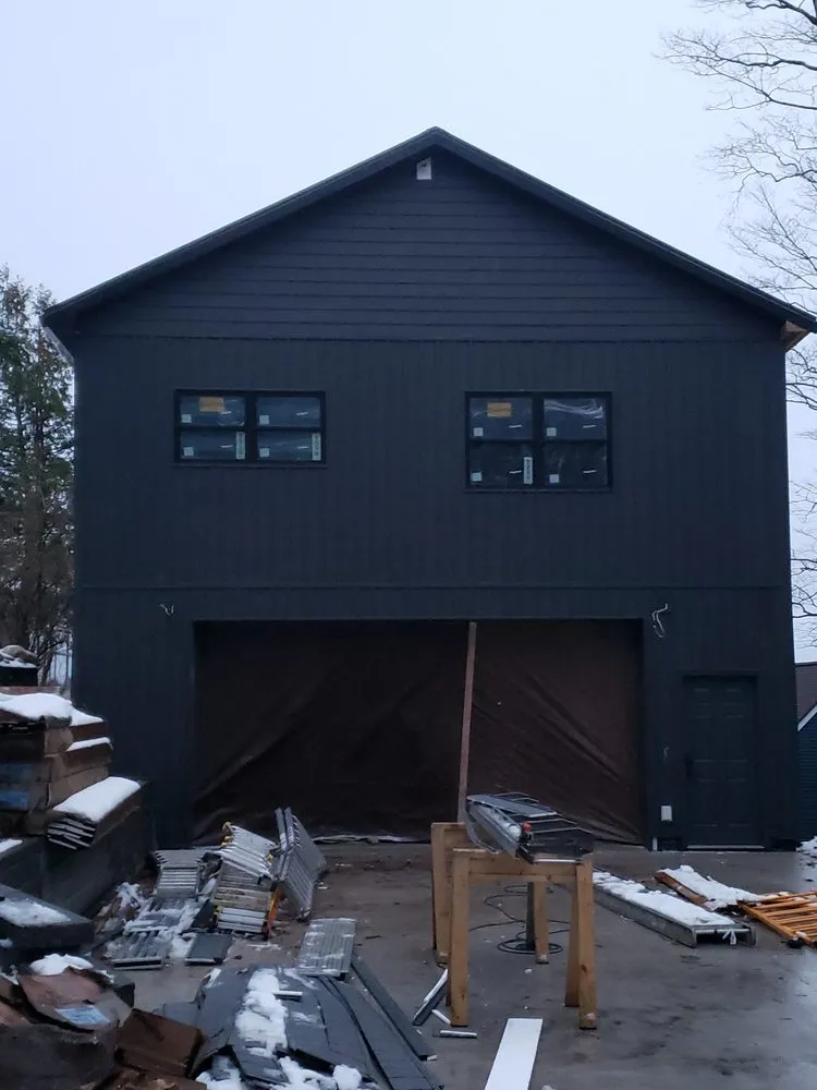 Trusted roof repair near you across Williamsburg, MI - Midwest Exteriors
