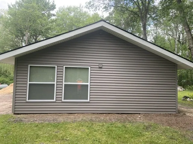 Local metal roofing installation in Williamsburg, MI by Midwest Exteriors