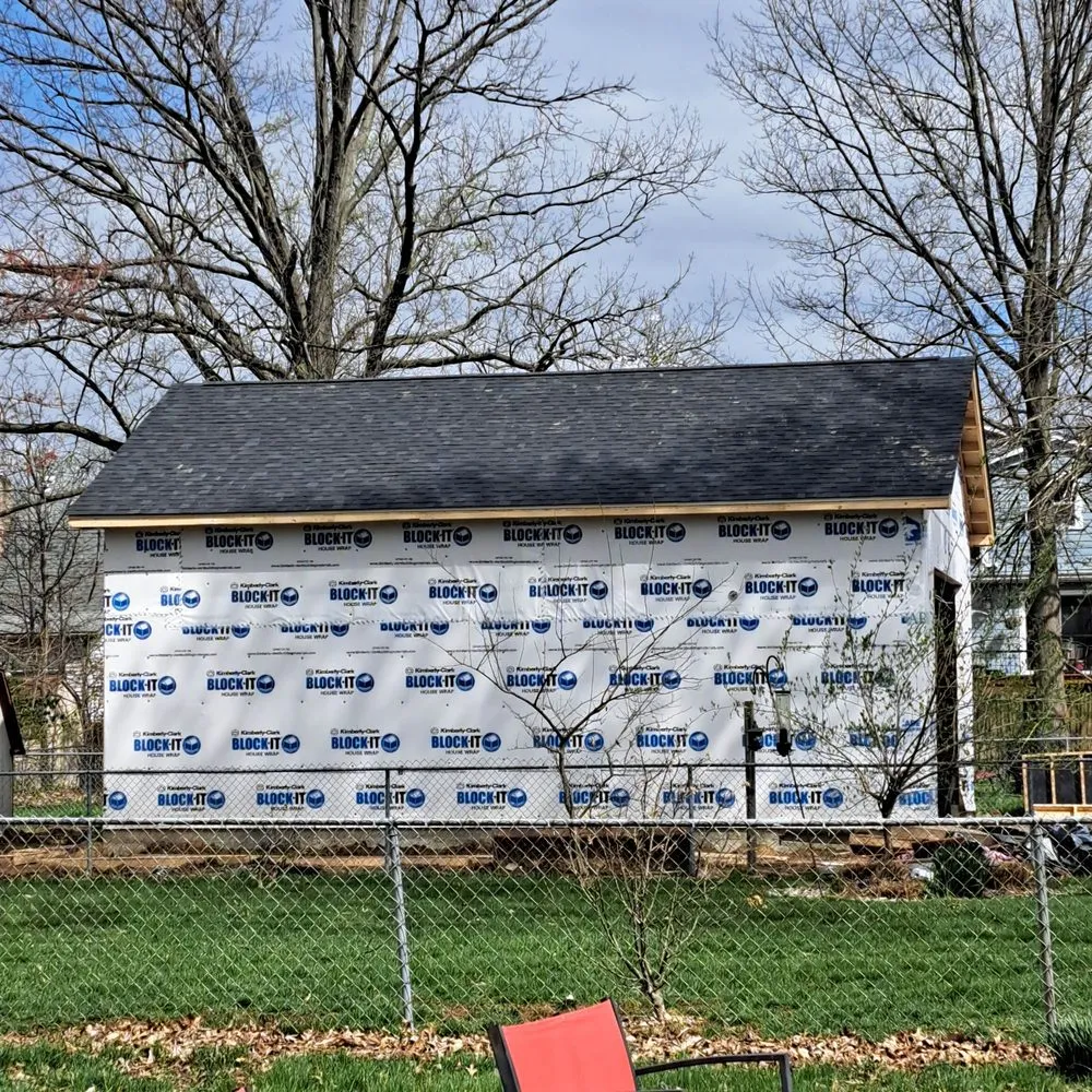 Slide of Midwest Roofing and Restoration