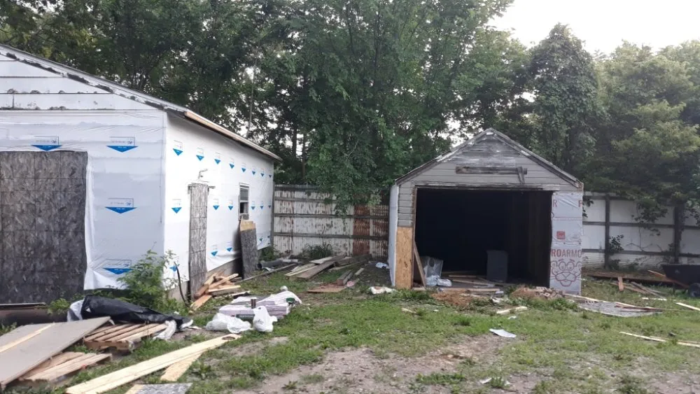 Slide of Midwest Roofing, Siding, Gutters and More