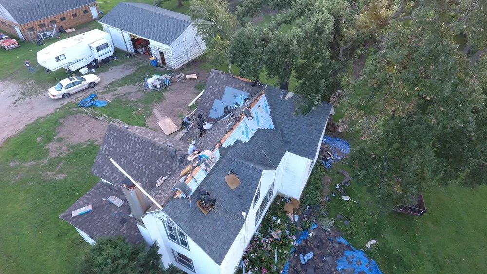 Local storm damage roof repair in Good Thunder, MN by Midwestern Construction