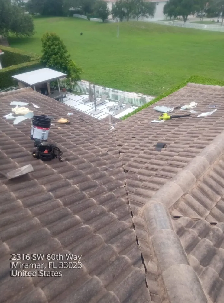 Slide of Mighty Dog Roofing Broward