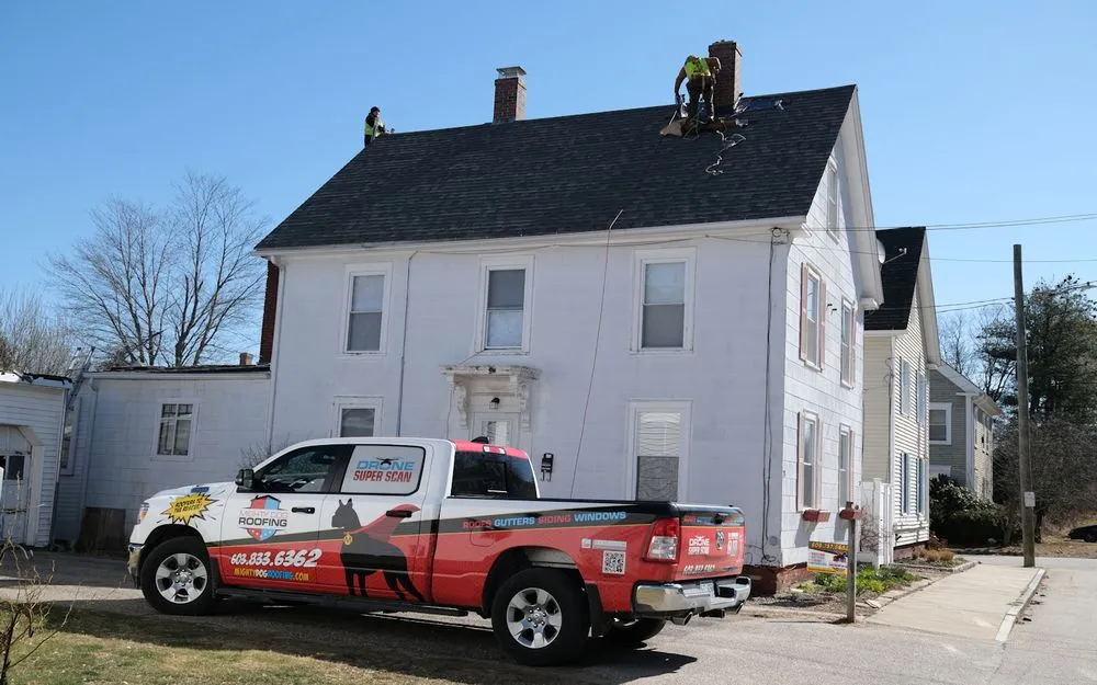 Slide of Mighty Dog Roofing