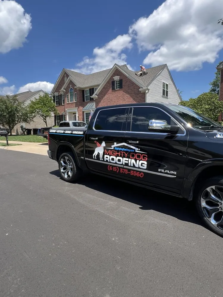 Slide of Mighty Dog Roofing