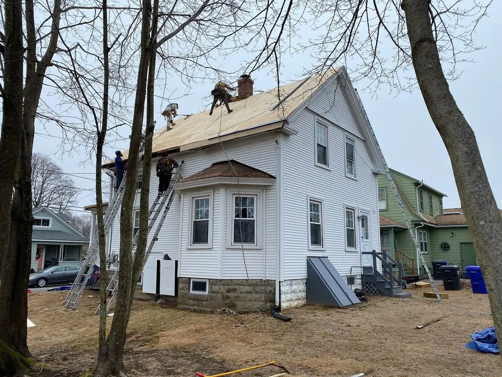 Slide of Mighty Dog Roofing