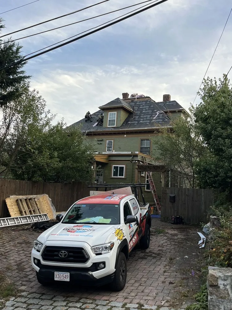 Slide of Mighty Dog Roofing of North Boston