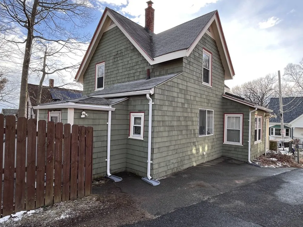 Slide of Mighty Dog Roofing of North Boston