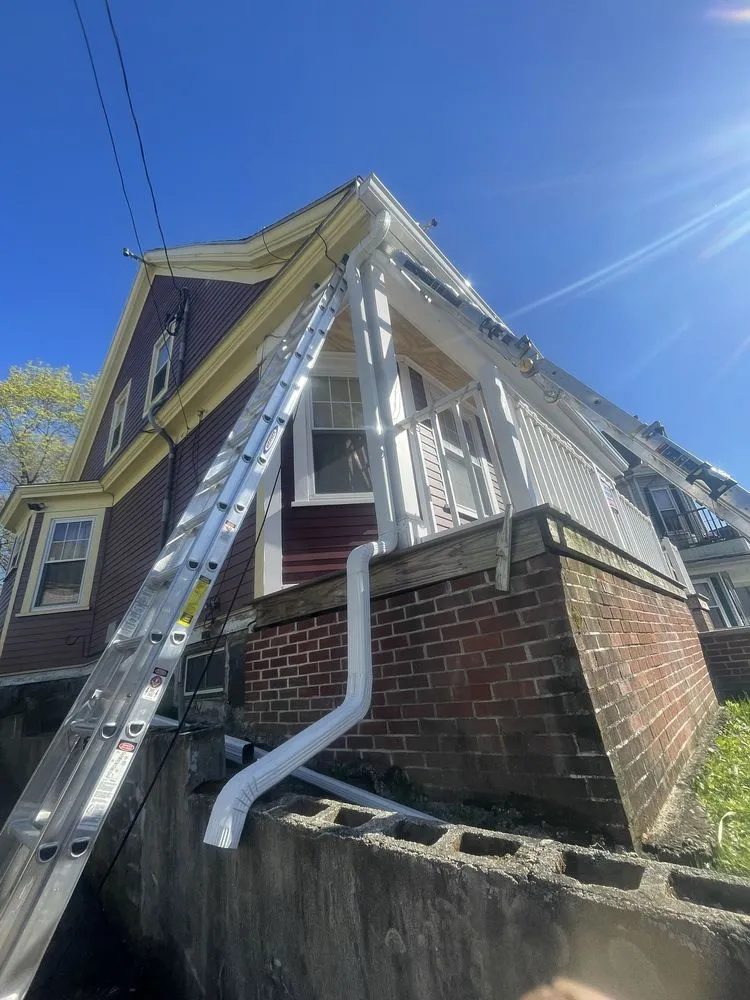 Slide of Mighty Dog Roofing of North Boston
