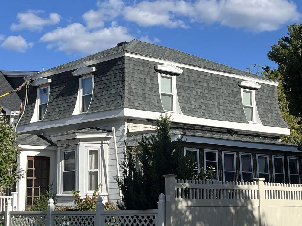 Slide of Mighty Dog Roofing of North Boston