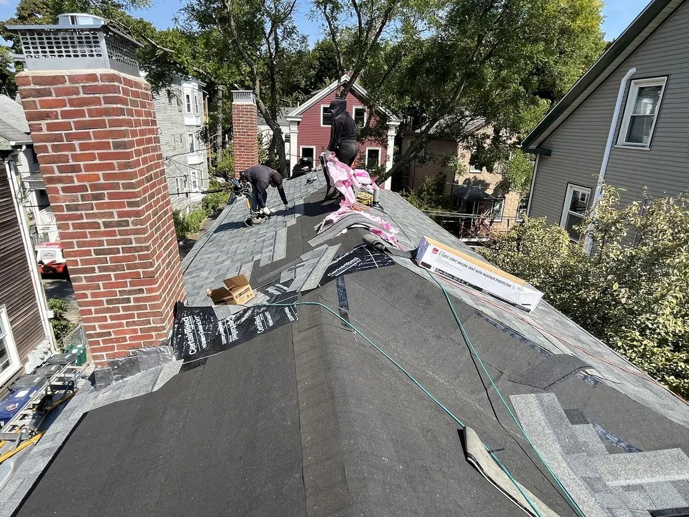 Slide of Mighty Dog Roofing of North Boston