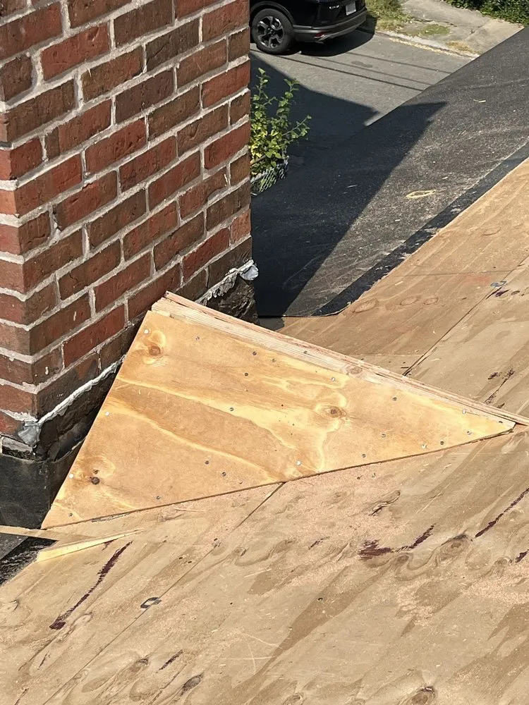 Slide of Mighty Dog Roofing of North Boston