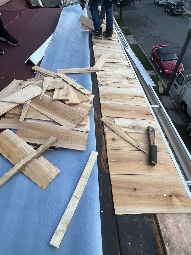 Slide of Mighty Dog Roofing of North Boston