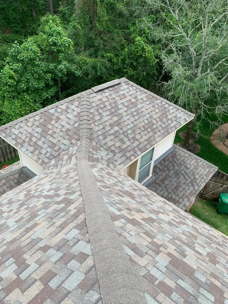 Slide of Mighty Dog Roofing of The Woodlands Area