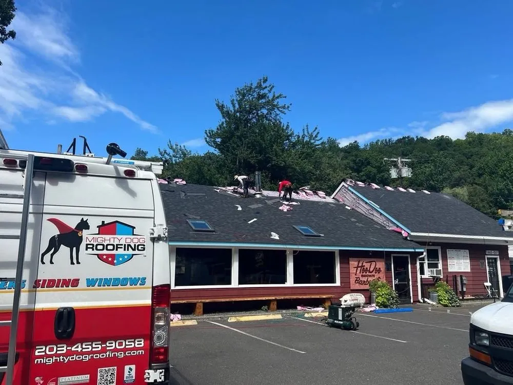 Slide of Mighty Dog Roofing