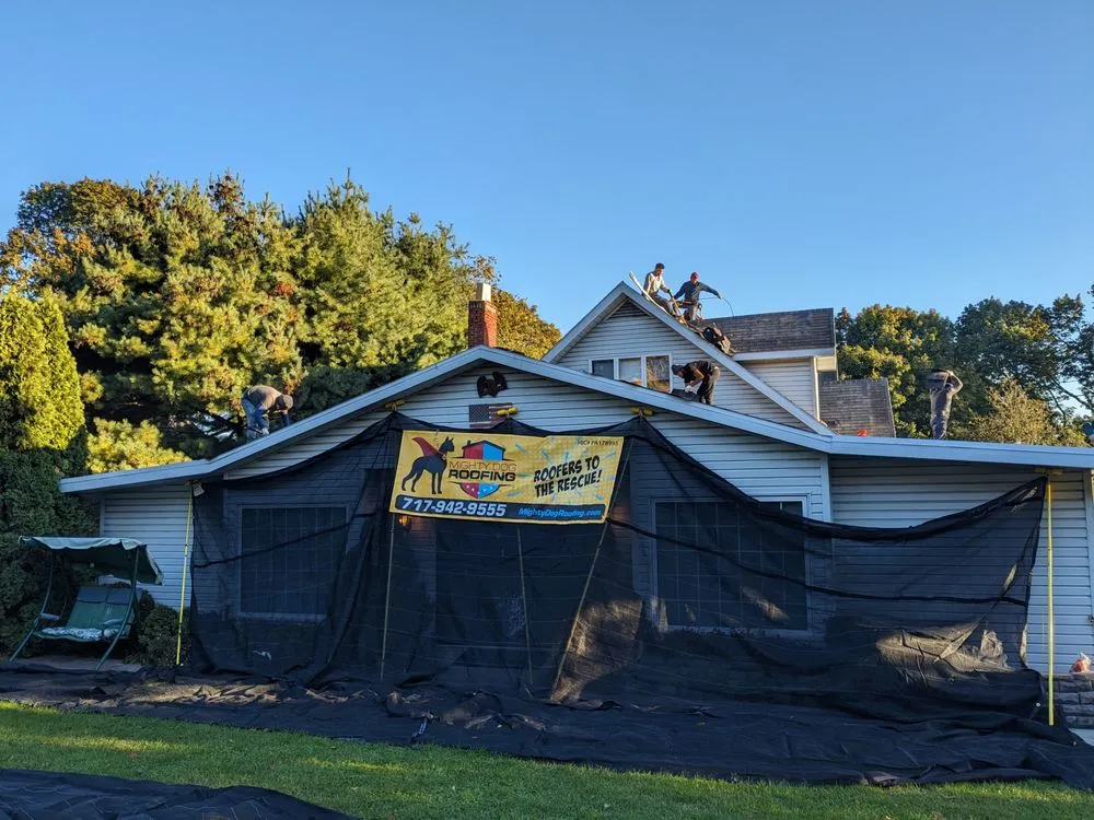 Slide of Mighty Dog Roofing