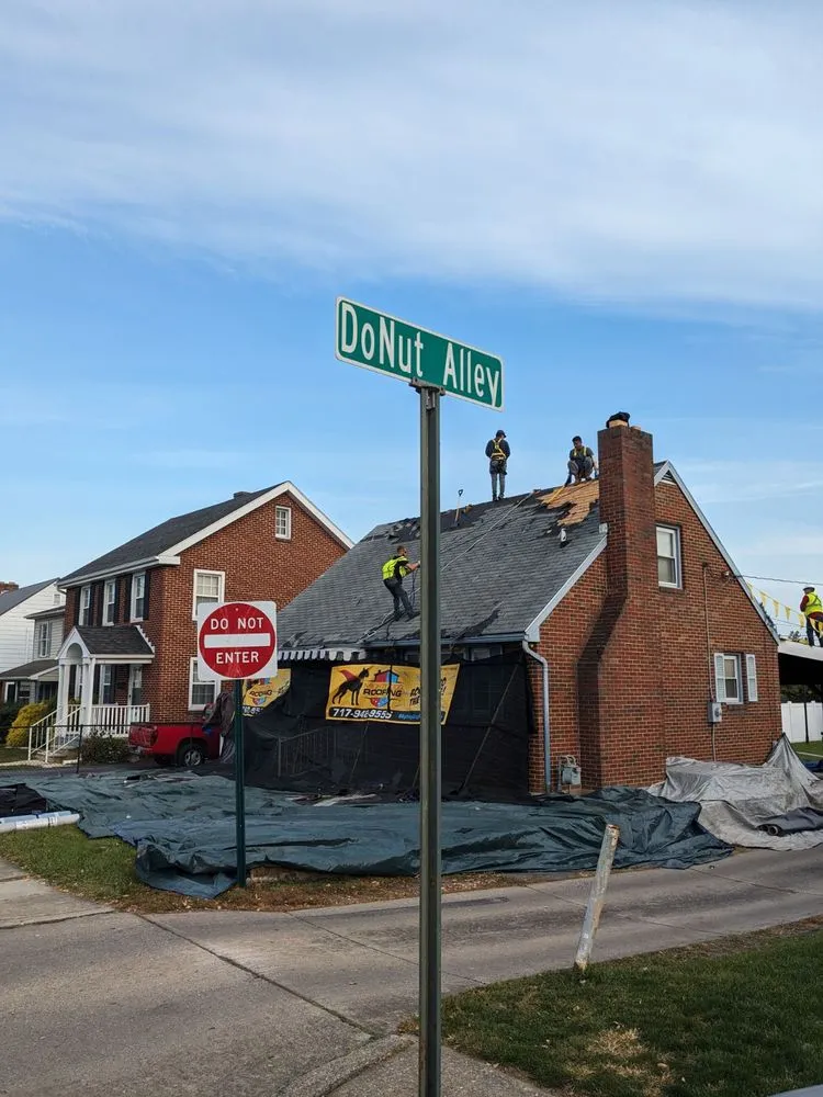 Slide of Mighty Dog Roofing