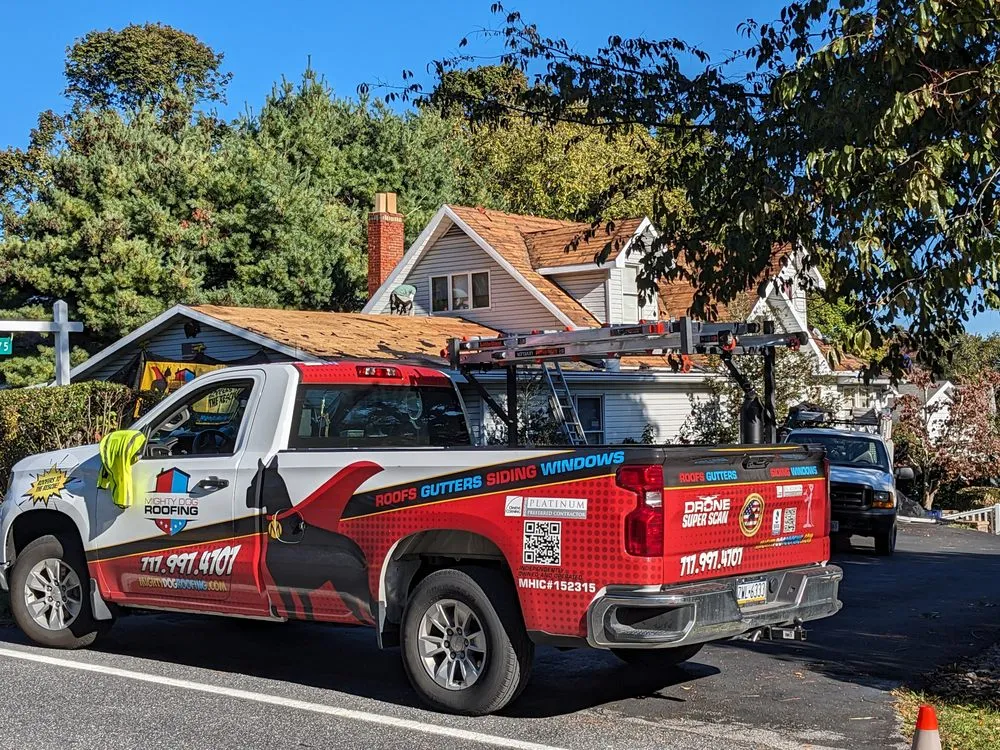 Slide of Mighty Dog Roofing