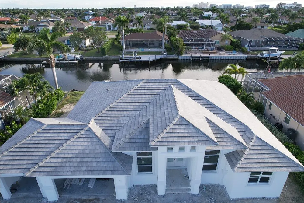 Slide of Mighty Fine Roofing