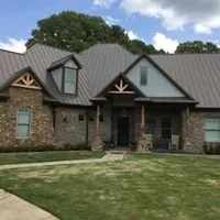 Slide of Mighty Metal Roofing