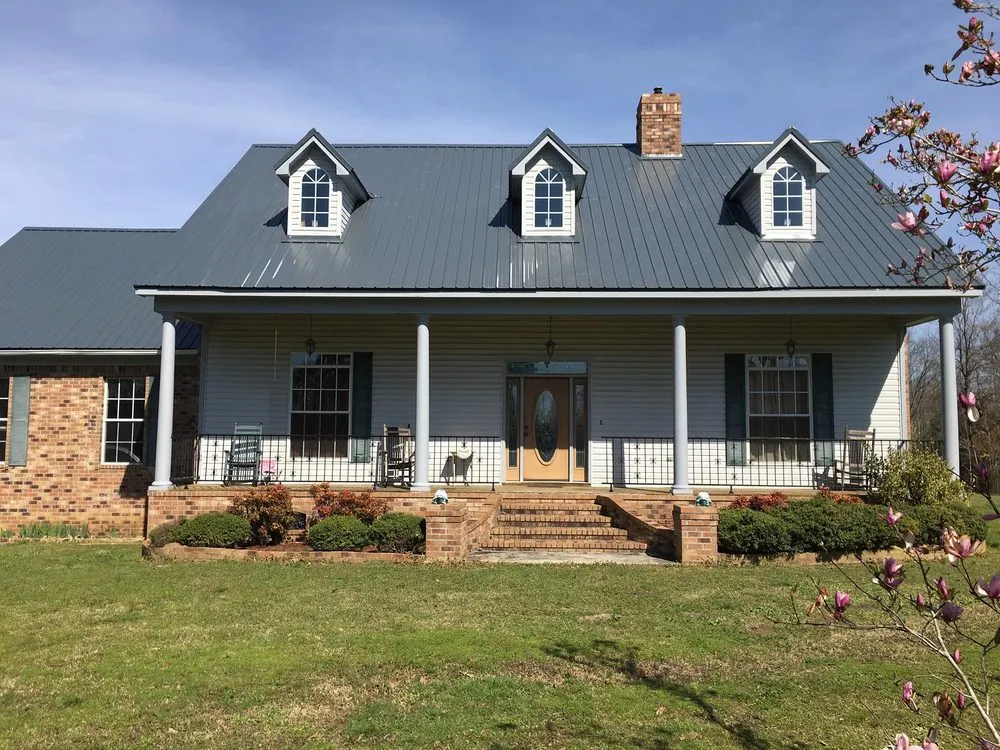 Slide of Mighty Metal Roofing