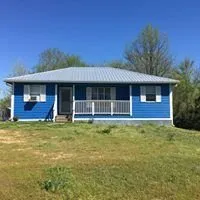 Slide of Mighty Metal Roofing