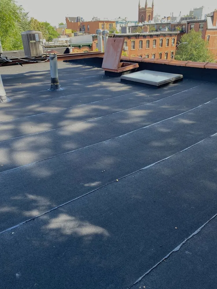 Slide of Mighty Roofing & Siding Contractors