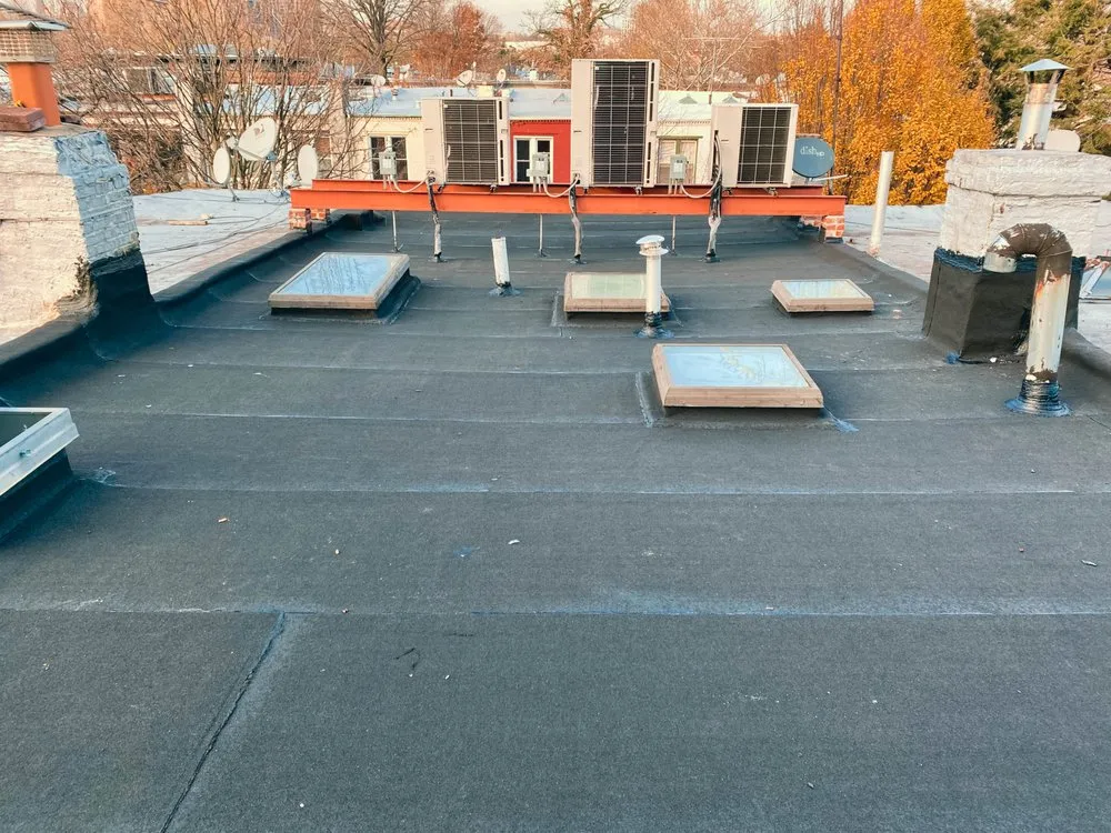 Slide of Mighty Roofing & Siding Contractors