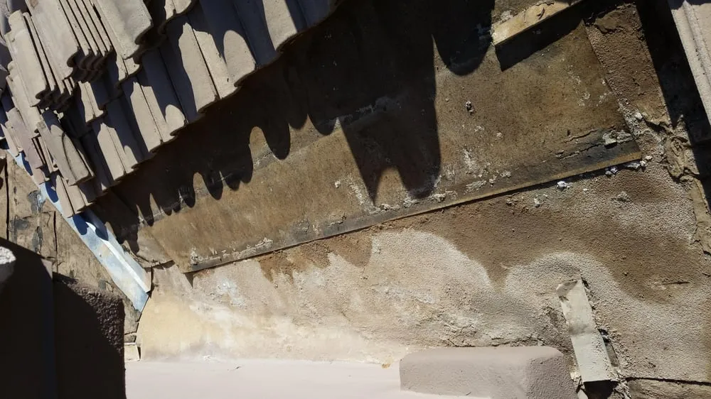 Slide of Mighty Roofing