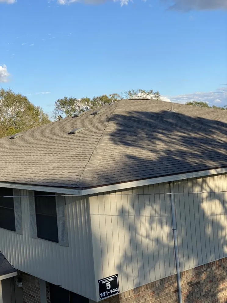 Slide of Migos Roofing