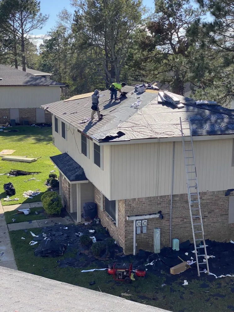 Slide of Migos Roofing