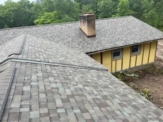 Slide of Miguel Roofing Company