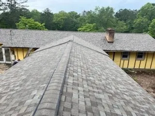 Slide of Miguel Roofing Company