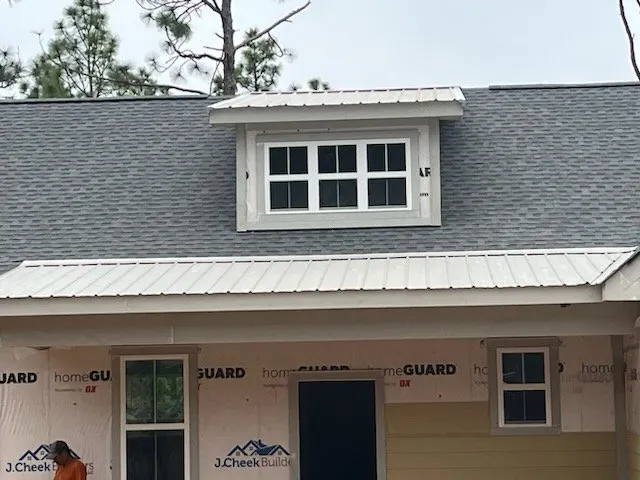 Slide of Miguel Roofing Company