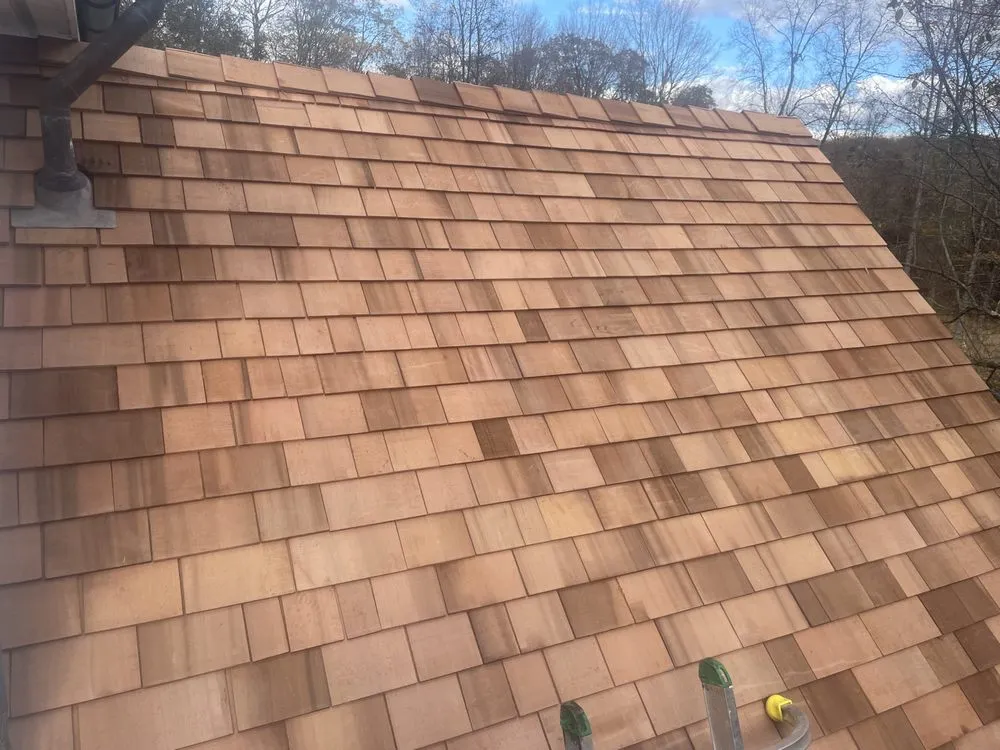 Slide of Miguel &Son Roofing