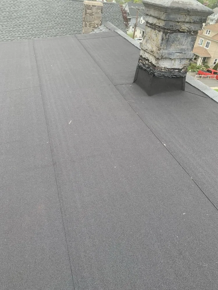 Slide of Miguel &Son Roofing