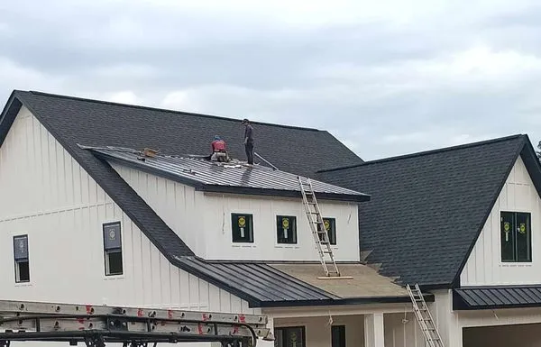 Mijangos Roofing Logo