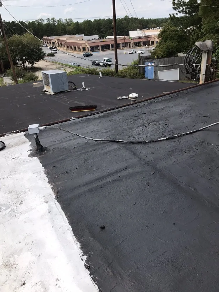 Slide of Mike Adams Roofing