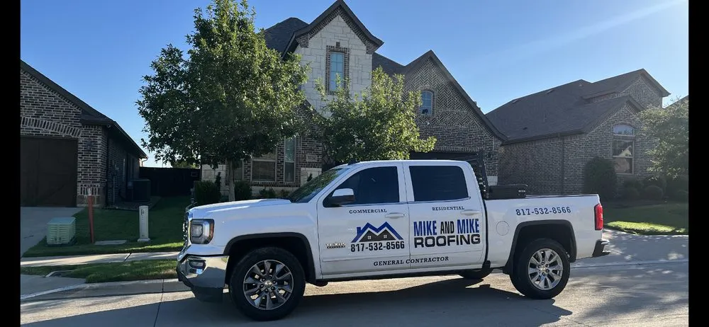 Slide of Mike and Mike Roofing