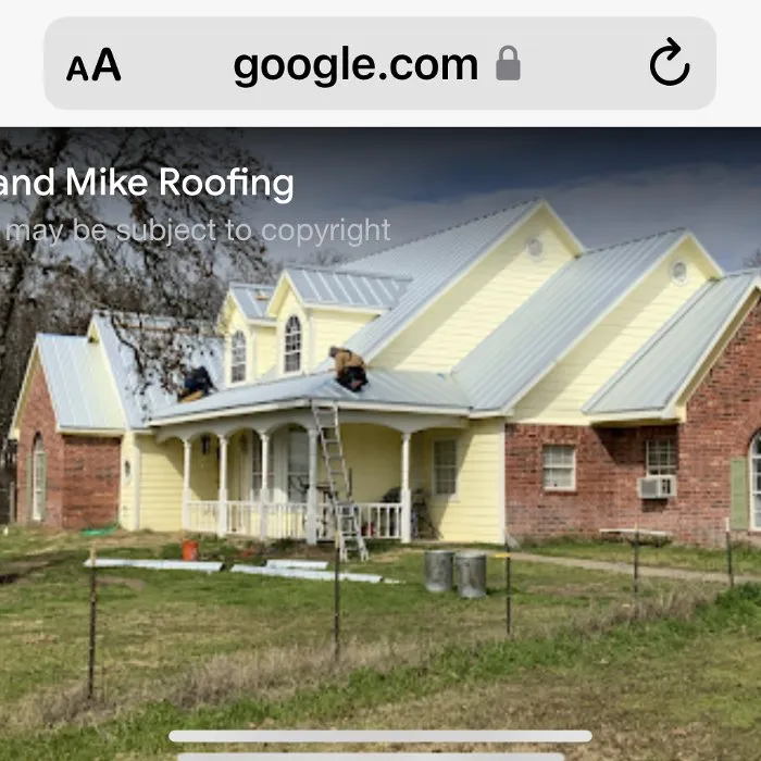 Slide of Mike and Mike Roofing