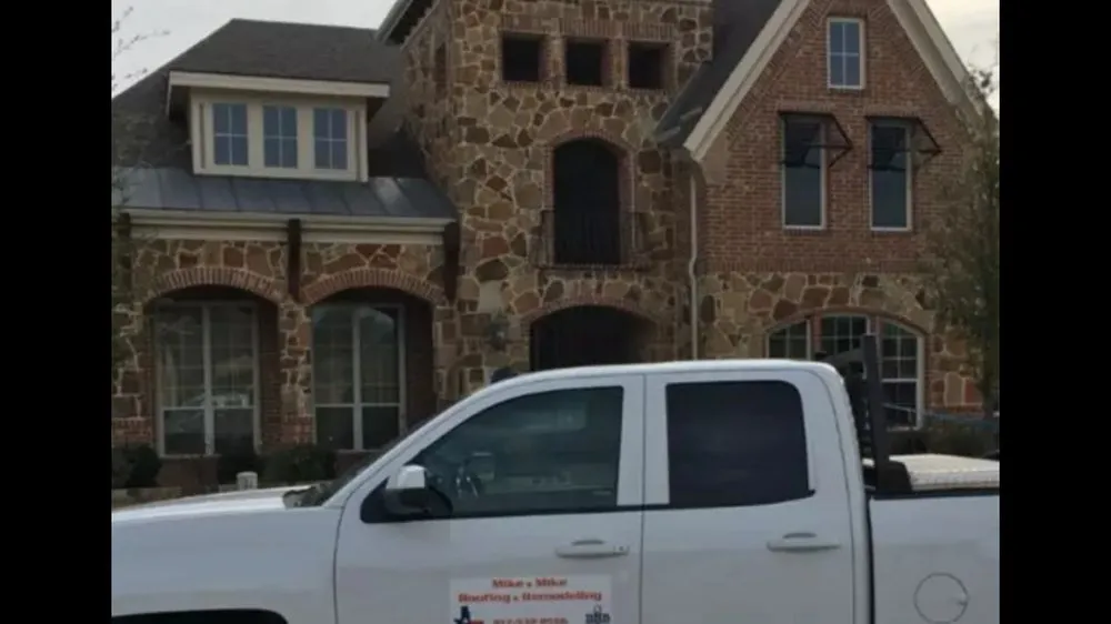 Slide of Mike and Mike Roofing