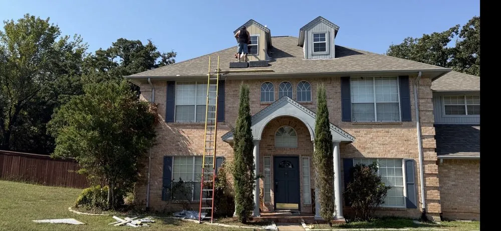 Slide of Mike and Mike Roofing