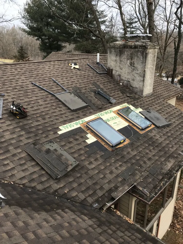 Slide of Mike Evangelist Roof Leaks