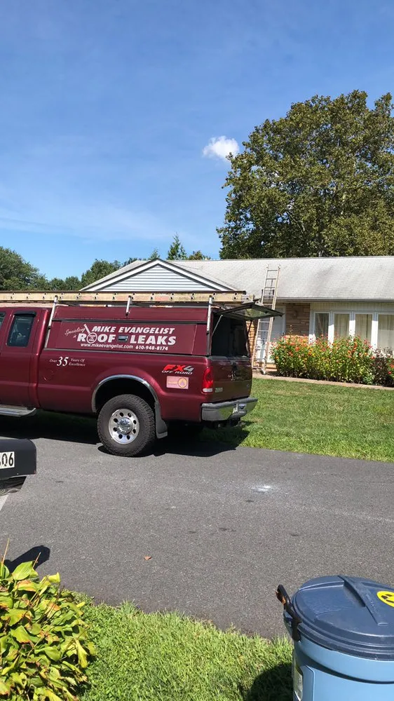 Slide of Mike Evangelist Roof Leaks