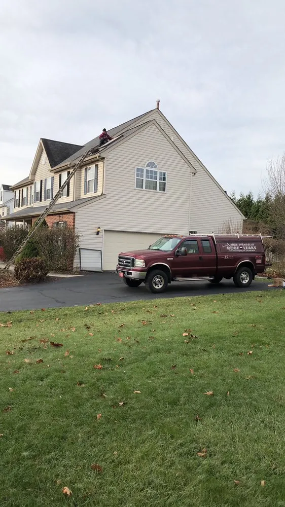 Slide of Mike Evangelist Roof Leaks