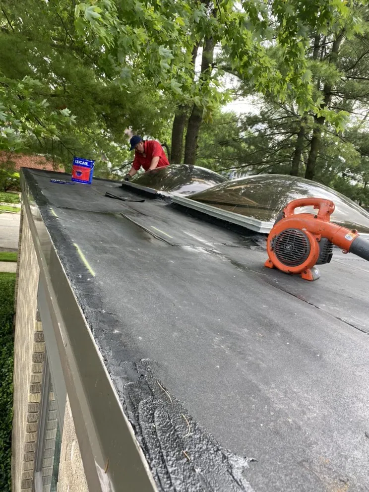 Slide of Mikes Flat Roofing Services