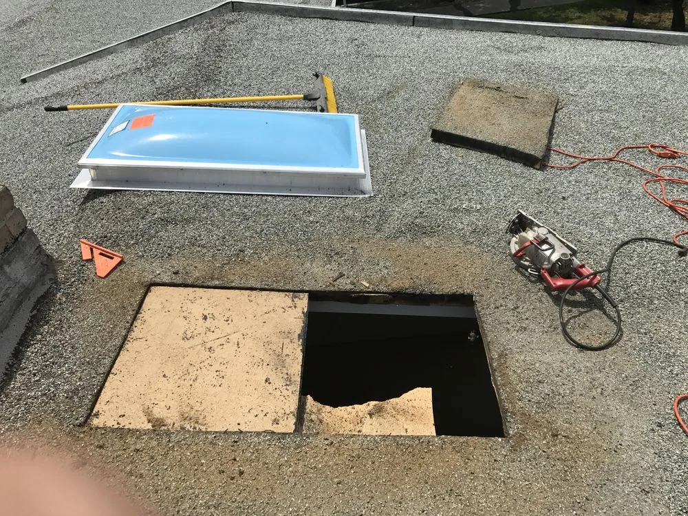 Slide of Mikes Flat Roofing Services