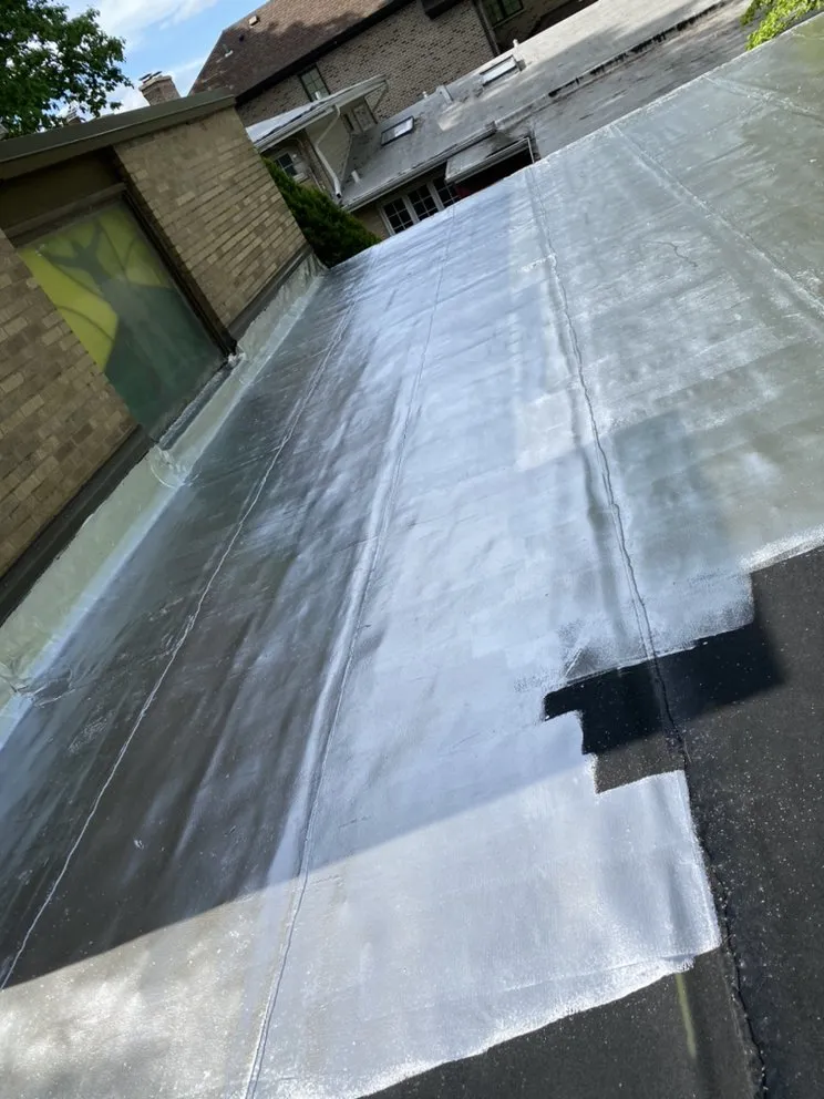 Slide of Mikes Flat Roofing Services