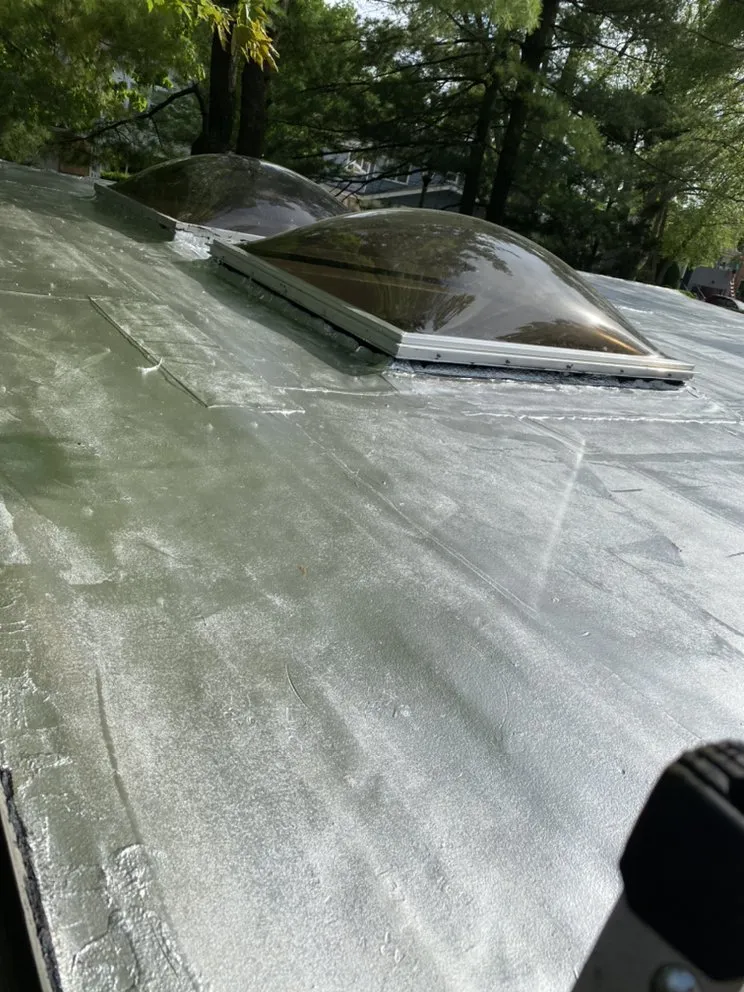 Slide of Mikes Flat Roofing Services