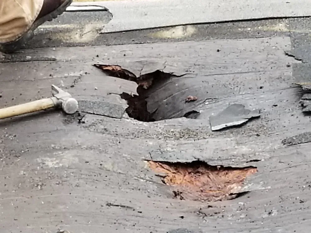 Slide of Mikes Flat Roofing Services