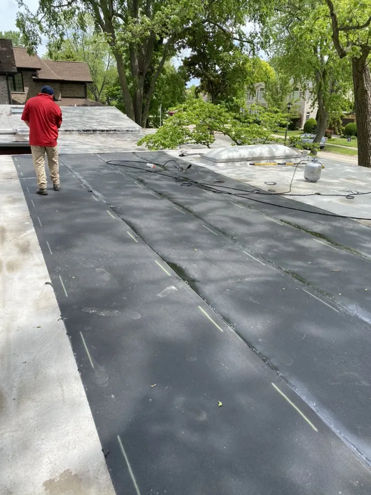 Slide of Mikes Flat Roofing Services